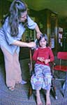 78-5 Susan Combing Becca's Hair
